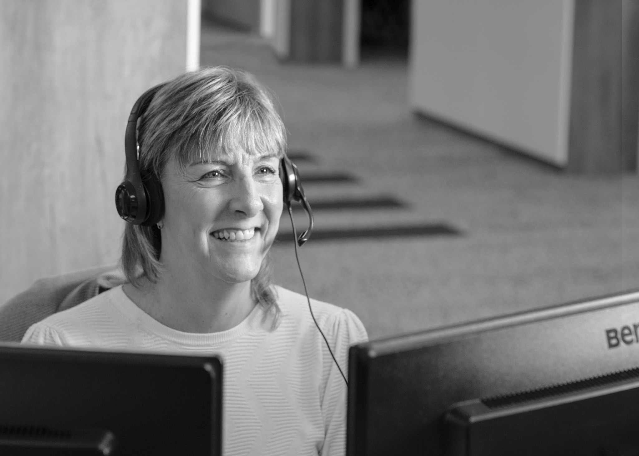 Picture of Member Services Team on phone
